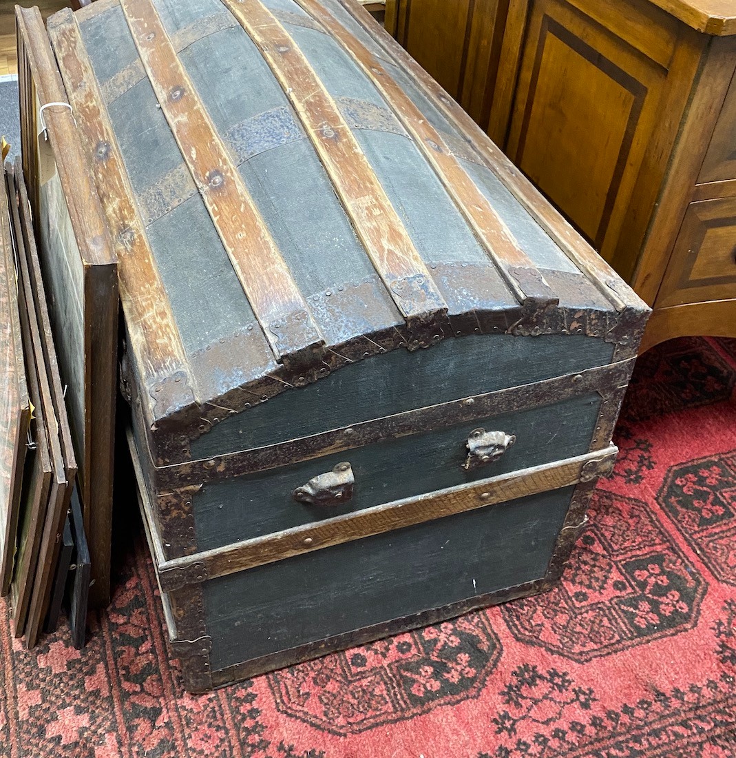 An early 20th century dome top travelling trunk, width 92cm, height 56cm